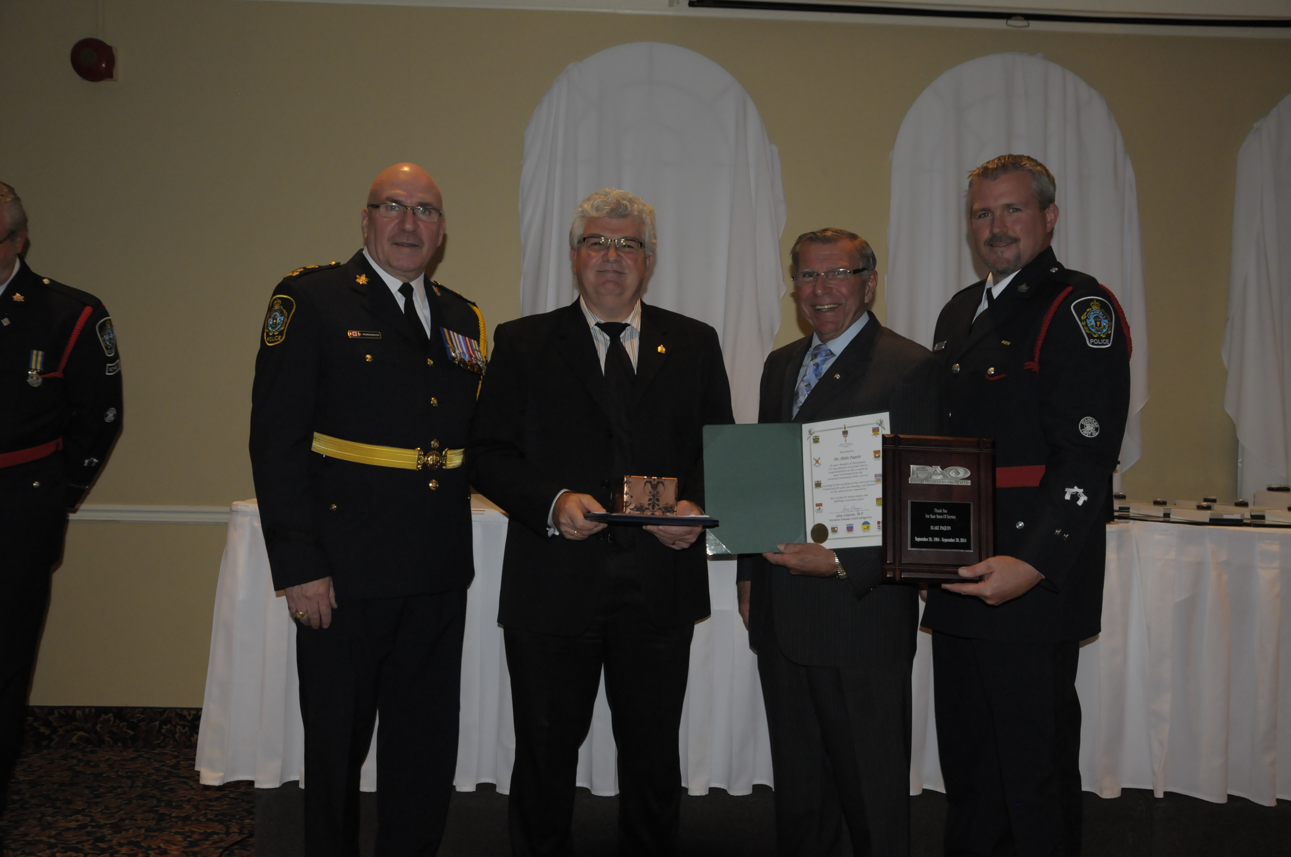 Pictured (from left) are Chief Dan Parkinson, Blake Paquin (Ret.), MP Guy Lauzon, CPA President Dave MacLean. (Cornwall Newswatch)