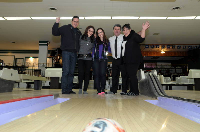 Like the bowling ball heading down the alley, the excitement is building for a chance to strike out a wait list for Big Brothers Big Sisters of Cornwall and District. Pictured, from left, BBBS President Bill Makinson, Honorary Chairwoman Christal Bowen, BBBS caseworker Vanessa Primeau and Tim Hortons franchise owners Nelson and Michelle Matos. The BBBS Bowl for Kids Sake is Feb. 7-8, 2015 in Cornwall and Chesterville. (Cornwall Newswatch/Bill Kingston)