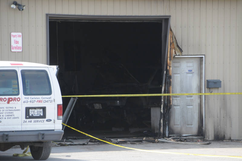 The fire appears to have been confined to a garage bay at the back of the building of this fire protection systems company on Carleton Street in Cornwall, Ont. on May 5, 2015. (Cornwall Newswatch/Bill Kingston)