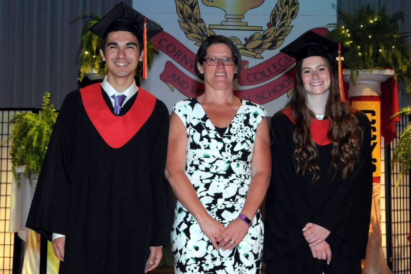 CCVS Principal Trish Brown, center, with co-valedictorians Randy Schmucker and Ainsley Hunt. The two graduates were among 112 students to receive their high school diploma June 25, 2015 during a ceremony at T.R. Leger School on Cumberland Street in Cornwall, Ont. (Cornwall Newswatch/Bill Kingston)