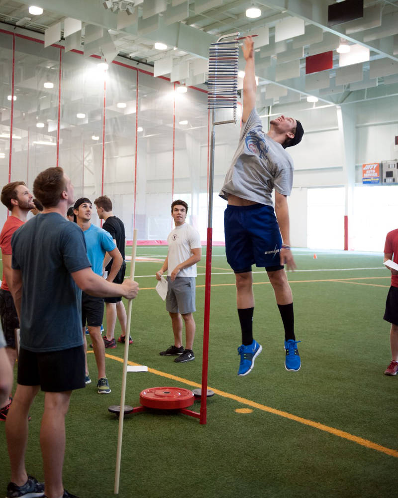Veteran Colts star Grant Cooper showcases his leaping ability during the fitness testing portion of the 2015 Colts training camp at Benson Center. Returning Colts stars Lawson MacDougall and James Edwardson along with Own The Ice Head Strength and Conditioning Coach Ian Perry look on. (Photo/Supplied)