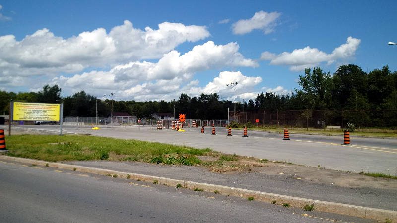 Traffic heading north on Akwesasne International Road, seen here on July 31, 2015,  temporarily has to detour around the site of the old customs building after two companies levelled the buildings under a joint venture project. (Cornwall Newswatch/Bill Kingston)