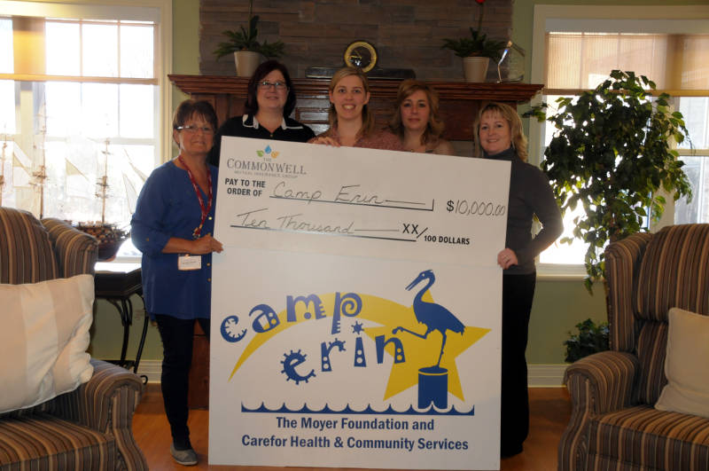 Members of Camp Erin receive a $10,000 cheque from Commonwell Mutual Insurance Group Monday, Feb. 22, 2016 in Cornwall. Ont. Making the presentation are Camp Eric director Michele Smith and Commonwell members Miki Paczek, Kate Ryan, Rachelle Joanette and Angie White. (Newswatch Group/Bill Kingston)