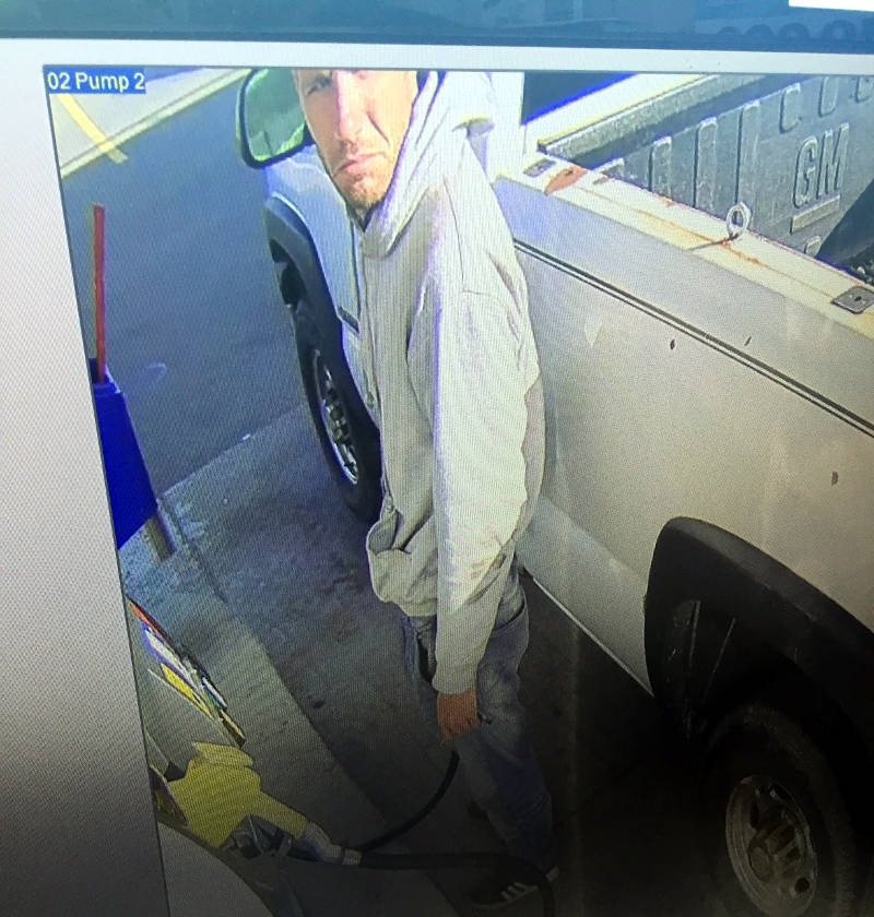 In this Monday, Sept. 26, 2016 photo provided by SD&G O.P.P., a man suspected of stealing a pickup truck in Morrisburg, Ont. is caught on security cameras at a nearby gas station. The man is also accused of driving away Saturday, Sept. 24, 2016 without paying. (SD&G O.P.P. via Newswatch Group)