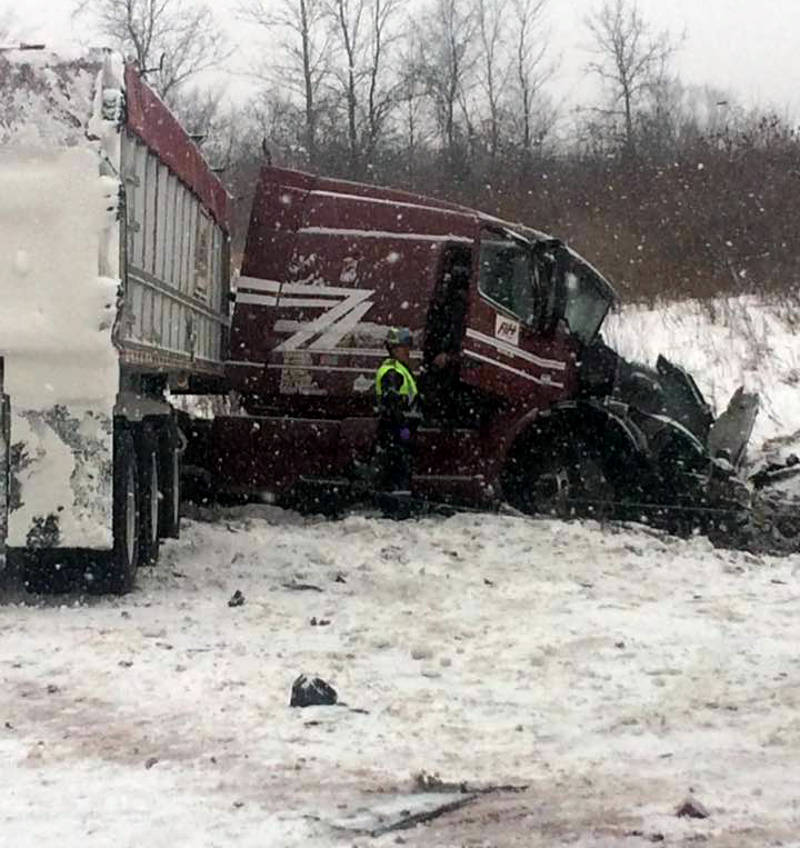 In this Saturday, Dec. 17, 2016 photo taken by Philippe Boyer Vazina, three tractor-trailers collided on a section of Highway 401, east of Cornwall, Ont. There are no reported injuries. (Philippe Boyer Vezina/Facebook via Newswatch Group)